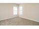 Bedroom featuring neutral walls, carpet floors, and windows providing plenty of natural light at 314 Montelena Pl, Cary, NC 27513