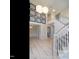 Stunning foyer with soaring ceilings, hardwood floors, and elegant lighting fixtures at 314 Montelena Pl, Cary, NC 27513