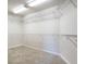 Spacious walk-in closet featuring multiple levels of shelving to maximize storage and organization at 314 Montelena Pl, Cary, NC 27513