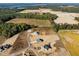 New neighborhood located near farmland and a dense tree line at 316 Little Lady Trail, Zebulon, NC 27597