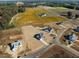 View of new construction in a neighborhood surrounded by farm land and trees at 316 Little Lady Trail, Zebulon, NC 27597