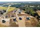 Primary planned community with homes near farm land, trees, and a body of water at 316 Little Lady Trail, Zebulon, NC 27597