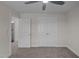 Neutral bedroom with ceiling fan, carpet flooring, and closet at 316 Little Lady Trail, Zebulon, NC 27597