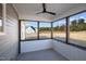 Screened porch with ceiling fan and view of backyard at 316 Little Lady Trail, Zebulon, NC 27597