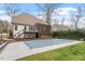 A house backyard featuring a pool and a well-manicured lawn at 3421 Griffice Mill Rd, Raleigh, NC 27610