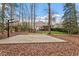 Backyard basketball court area near home at 3421 Griffice Mill Rd, Raleigh, NC 27610