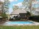 Backyard features a sparkling in-ground pool, perfect for summertime fun at 3421 Griffice Mill Rd, Raleigh, NC 27610