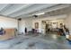 Spacious two-car garage featuring ample storage and a convenient workspace at 3508 Longleaf Estates Dr, Raleigh, NC 27616