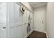 Convenient mudroom with coat hooks, storage, and easy access to the garage at 3508 Longleaf Estates Dr, Raleigh, NC 27616