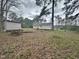 Spacious backyard with a storage shed and plenty of room for outdoor activities at 4989 Nc 217, Erwin, NC 28339