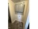Functional laundry area with overhead cabinets and laundry hookups at 4989 Nc 217, Erwin, NC 28339