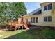 Spacious backyard featuring a wooden deck and lush greenery at 509 Edgemore Ave, Cary, NC 27519