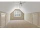 Finished attic bonus room with neutral carpet, dormer window, and closets at 509 Edgemore Ave, Cary, NC 27519