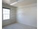 Walk-in closet with ample shelving for storage and a bright window for natural light at 509 Edgemore Ave, Cary, NC 27519
