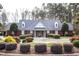 Community clubhouse featuring manicured landscaping at 509 Edgemore Ave, Cary, NC 27519