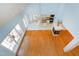 Open concept living room showcasing fireplace, hardwood floors and natural light at 509 Edgemore Ave, Cary, NC 27519