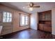 Charming dining room featuring a ceiling fan, bay window, and built-in wooden hutch at 510 Corrida Ave, Durham, NC 27704
