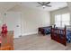 Bedroom features vaulted ceilings, twin beds, and wood-look floors at 5102 Highcroft Dr, Cary, NC 27519