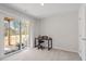 Bright office space with a sliding glass door and views of the backyard at 515 Autumn Cure Ct, Fuquay Varina, NC 27526