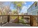 Enjoy outdoor living on this wooden deck with views of the backyard and surrounding greenery at 517 Coleman St, Raleigh, NC 27610
