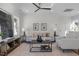 Bright living room with neutral tones, modern furniture, and natural light creates a comfortable space at 517 Coleman St, Raleigh, NC 27610
