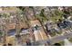 Aerial view showcases the property's placement within a tranquil, tree-lined residential neighborhood at 518 W Chisholm St, Sanford, NC 27330