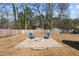 Spacious backyard features a fire pit area perfect for outdoor entertaining at 518 W Chisholm St, Sanford, NC 27330