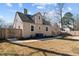 Charming backyard of home with new sidewalk and lawn space at 518 W Chisholm St, Sanford, NC 27330