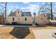 Cozy home backyard featuring a patio area and fresh landscaping at 518 W Chisholm St, Sanford, NC 27330