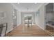 Bright dining room featuring modern lighting and views to the exterior at 518 W Chisholm St, Sanford, NC 27330