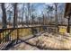 Outdoor deck furnished with a table and chairs perfect for relaxing or entertaining at 5315 Cole Mill Rd, Durham, NC 27705