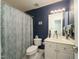 This bathroom offers a tub and shower and plenty of cabinet space at 58 Lake Village Drive Dr, Durham, NC 27713