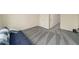 This bedroom features plush carpeting and a versatile layout at 58 Lake Village Drive Dr, Durham, NC 27713