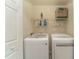 Laundry room includes modern washer and dryer at 58 Lake Village Drive Dr, Durham, NC 27713