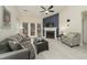 Bright living room with fireplace, neutral paint, hardwood flooring, and natural light at 58 Lake Village Drive Dr, Durham, NC 27713