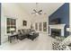 Bright living room with fireplace, neutral paint, hardwood flooring, and natural light at 58 Lake Village Drive Dr, Durham, NC 27713