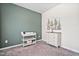 A Bedroom offers calming colors with a dresser and changing table for convenience and style at 606 Marian Way, Sanford, NC 27330