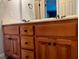 Bathroom featuring a vanity with double sinks and wood cabinets at 61 Langdon Pointe Dr, Garner, NC 27529