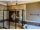 The bathroom features a glass shower and a soaking tub at 61 Langdon Pointe Dr, Garner, NC 27529