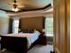 Bright bedroom with a ceiling fan and natural light at 61 Langdon Pointe Dr, Garner, NC 27529
