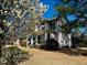 Two story home surrounded by grass and trees at 61 Langdon Pointe Dr, Garner, NC 27529