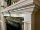Close up of a stone fireplace and white mantle at 61 Langdon Pointe Dr, Garner, NC 27529