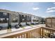 Exterior shot of community featuring rows of townhomes and attached garages at 6434 Astor Elgin St, Raleigh, NC 27616