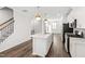 Modern kitchen with island, stainless appliances, and stylish pendant lighting at 6434 Astor Elgin St, Raleigh, NC 27616