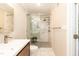Updated bathroom featuring a glass door shower with modern fixtures and a single sink vanity at 700 Bishops Park Dr # 205, Raleigh, NC 27605