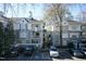 Beautiful condominium building with a classic facade, balcony, and dedicated parking including accessible spaces at 700 Bishops Park Dr # 205, Raleigh, NC 27605