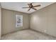 Neutral bedroom featuring a ceiling fan, window with blinds, and carpeted floors at 71 Oak Trace Dr, Four Oaks, NC 27524