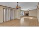 The living room features wood-look floors, a ceiling fan and a fireplace at 71 Oak Trace Dr, Four Oaks, NC 27524