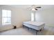 Neutral bedroom with natural light and ceiling fan at 7216 Bluffside Ct, Raleigh, NC 27615