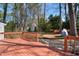 Expansive stained deck overlooking the private, wooded backyard in a beautiful home at 7216 Bluffside Ct, Raleigh, NC 27615